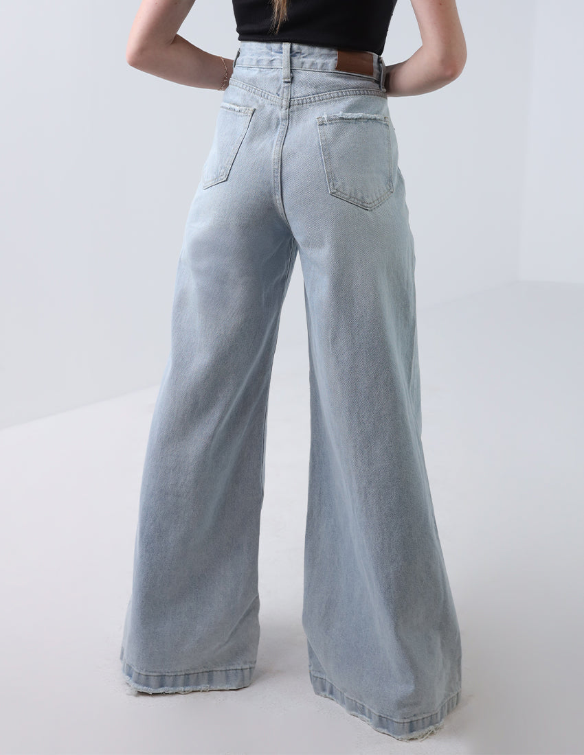 High-waisted wide-leg jeans icy blue flared at the bottom.