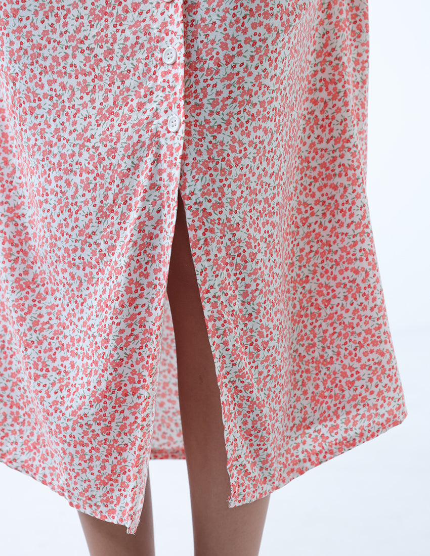 تنورة ميدي حمراء مزهرة بأزرار