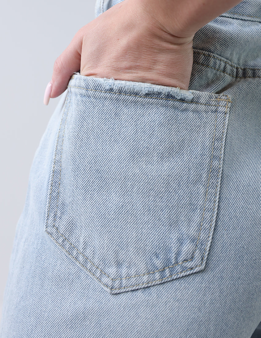 High-waisted wide-leg jeans icy blue flared at the bottom.