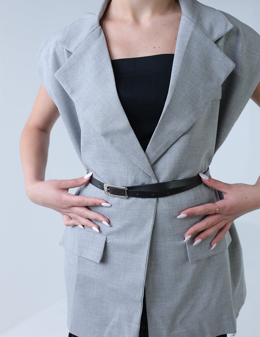 Oversized vest with black belt
