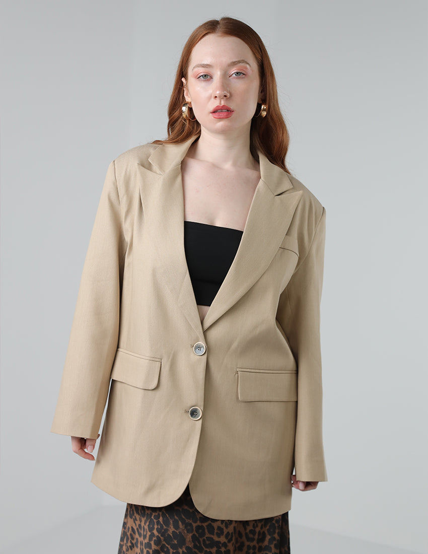 Beige oversized blazer with "WILD"