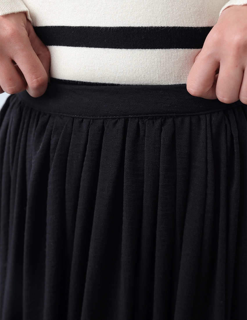 Long pleated flowy skirt