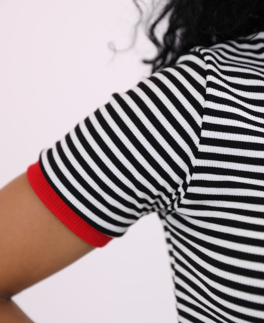 Black and white striped T-shirt with red trim