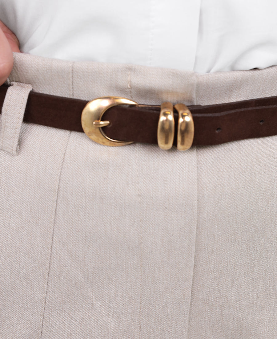 pleated trousers with a brown belt
