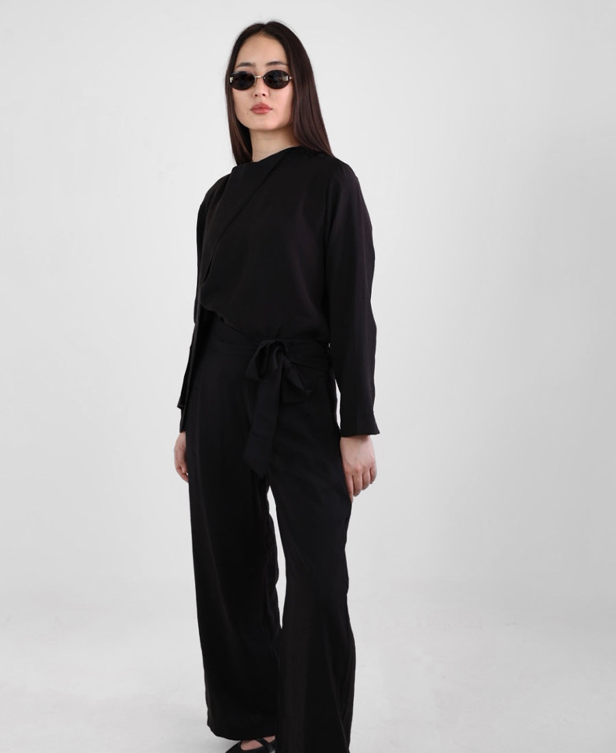 Black set of blouse with tie shoulder buttons and wide leg pants with tie waist