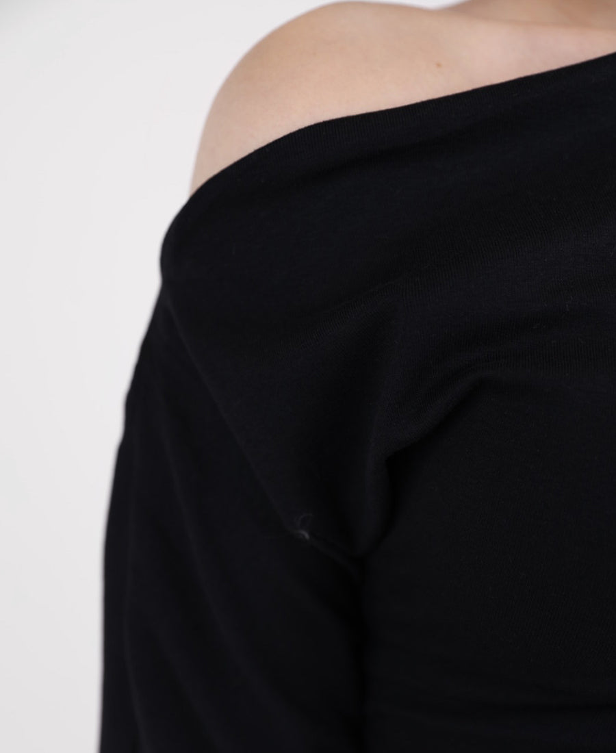Black T-shirt with a slanted neckline and a gathered waist