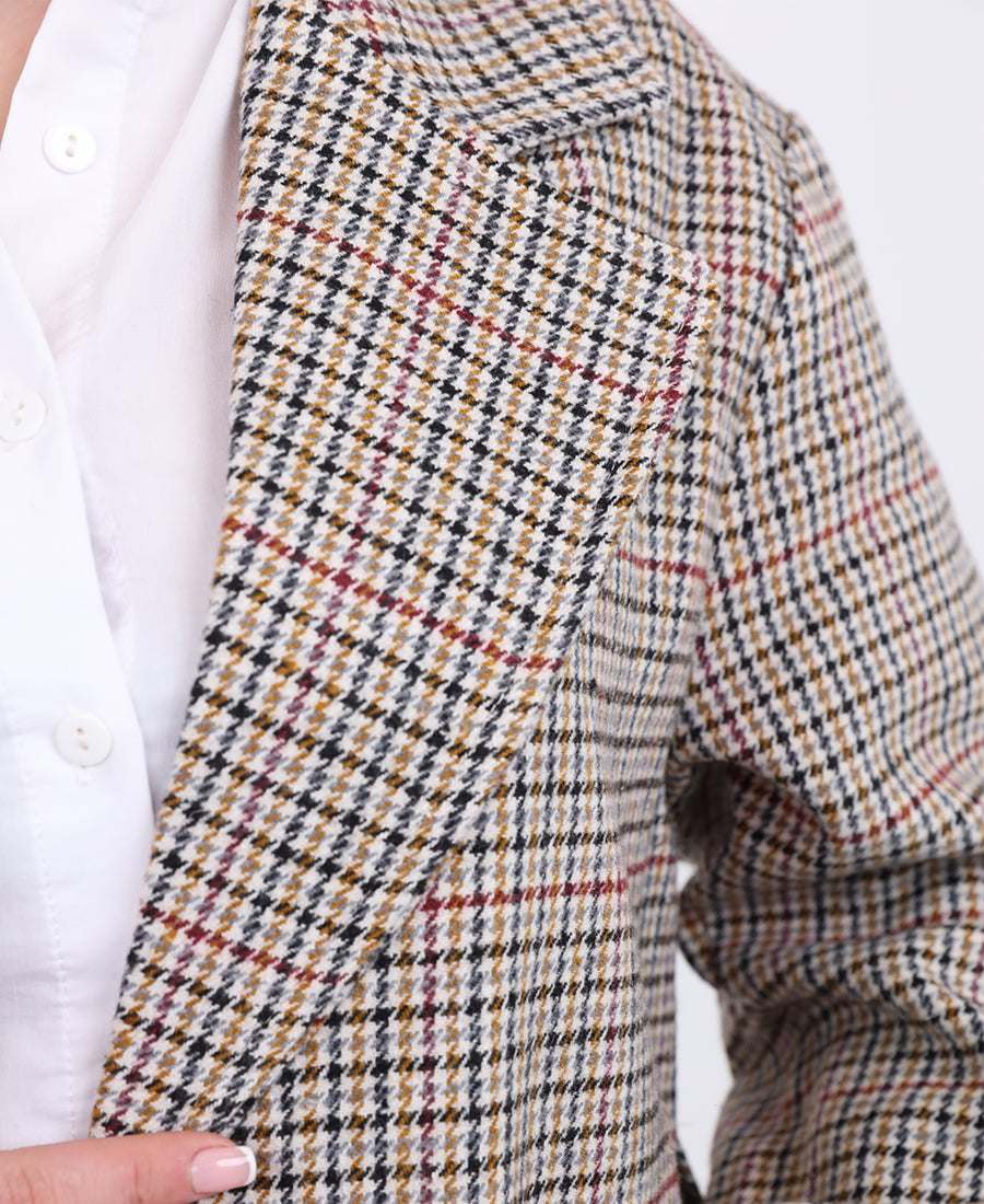 Long striped jacket with a belt at the waist