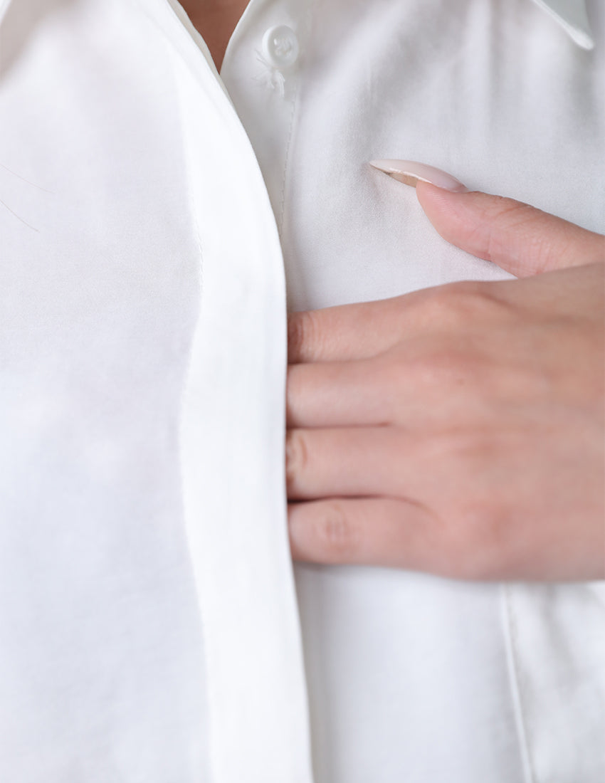 قميص كبير الحجم مع جيب جانبي