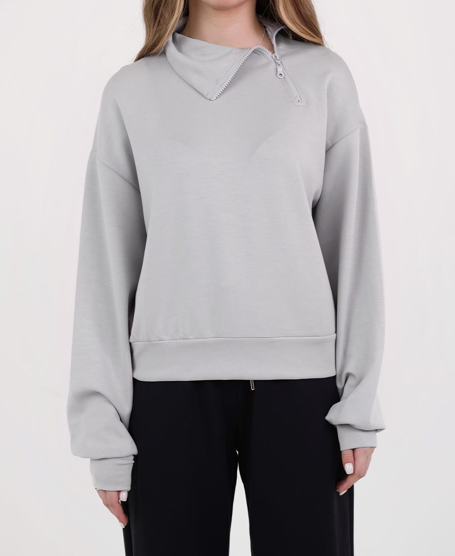 High neck blouse with slanted zipper