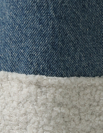 High-waisted jeans with a stripe and wool underneath