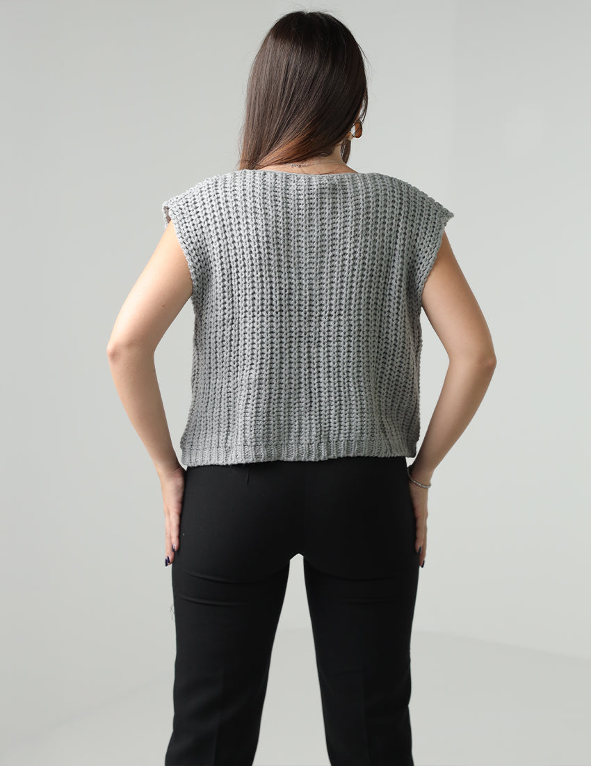 سترة صوفية بأكمام قصيرة وأزرار وجيوب