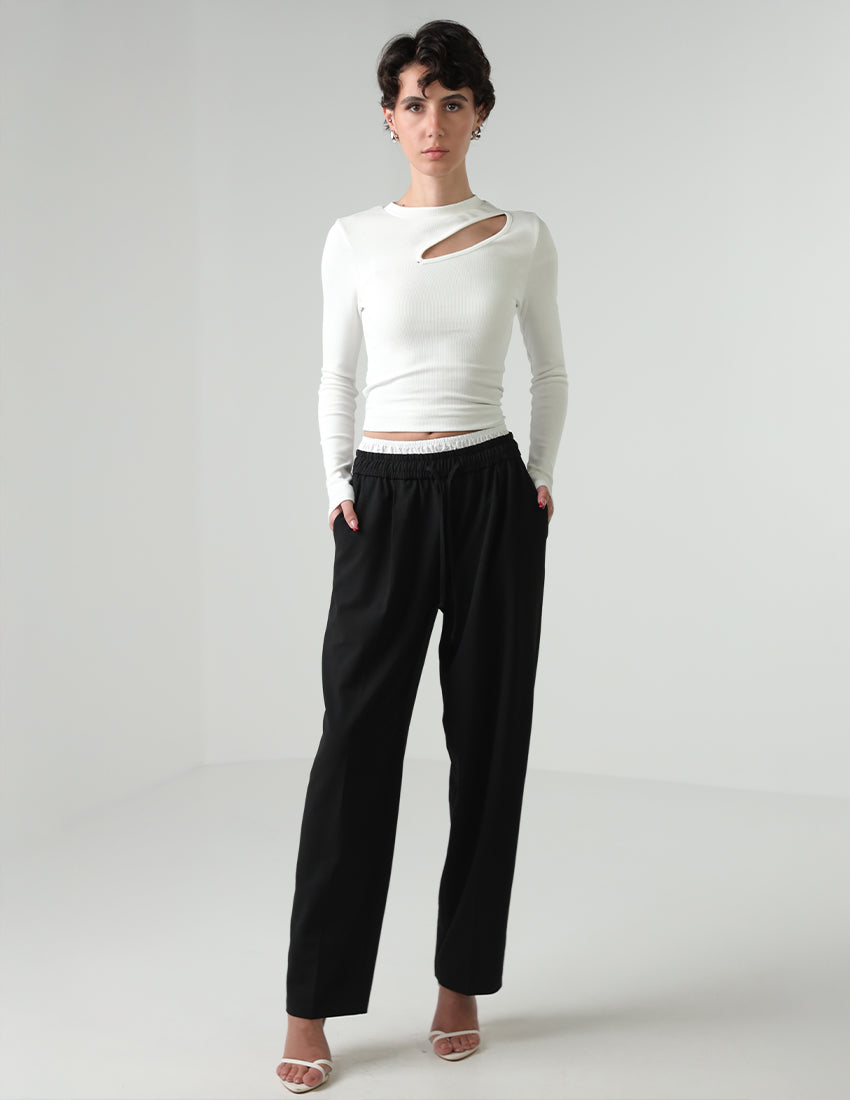 Black straight-cut pants with a white elastic waistband