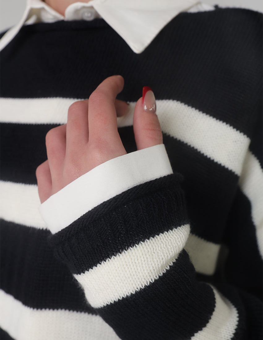 بلوزة مخططة باللونين الأبيض والأسود