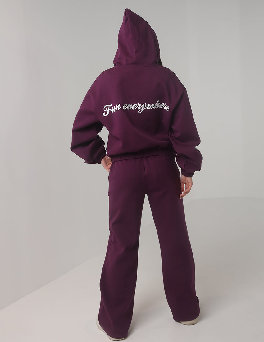 بدلة رياضية بغطاء رأس وسحاب مع بنطال واسع الساق