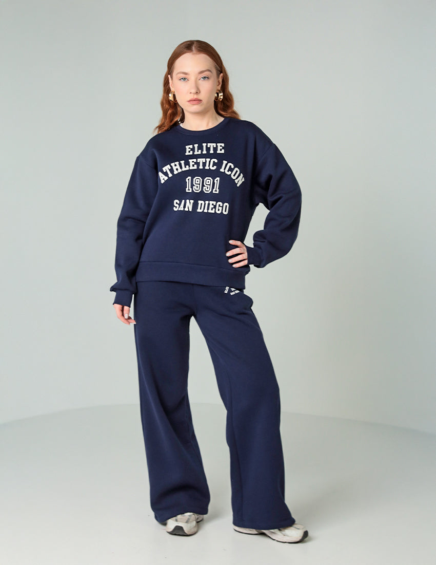 طقم من قطعتين: سويت شيرت وبنطال واسع الساقين