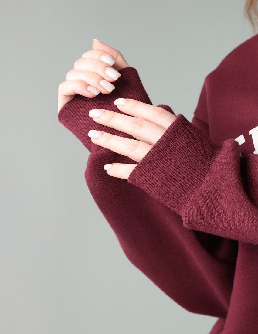 طقم من قطعتين: سويت شيرت وبنطال واسع الساقين