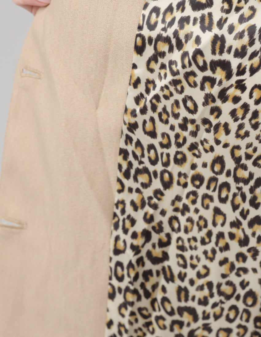 Beige oversized blazer with "WILD"