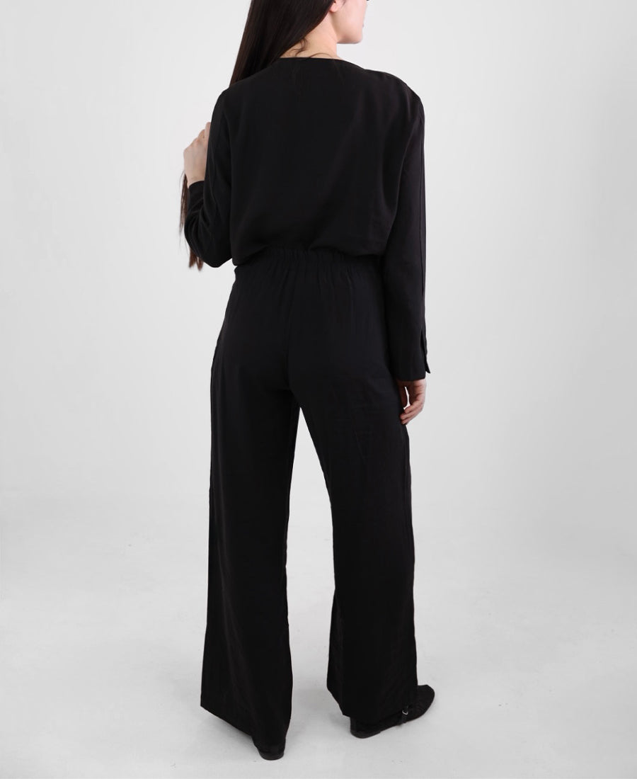 Black set of blouse with tie shoulder buttons and wide leg pants with tie waist
