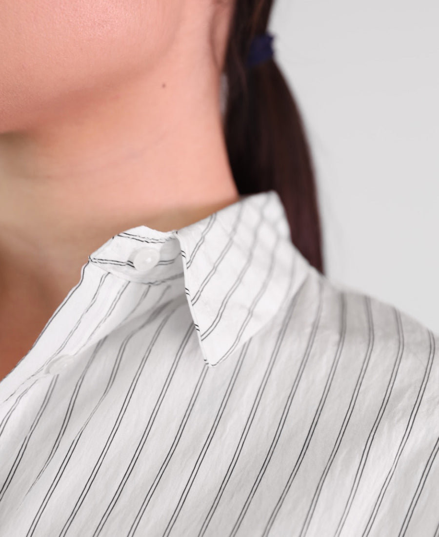 Oversized white shirt with black stripes