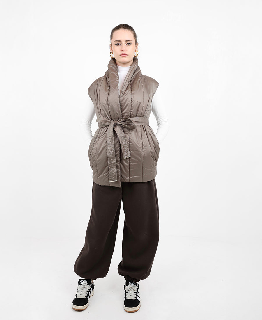 Vest on the back is wool with belt