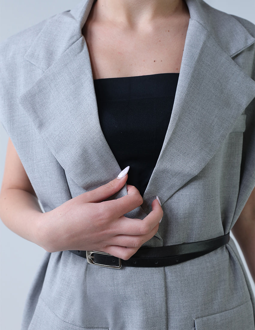 Oversized vest with black belt