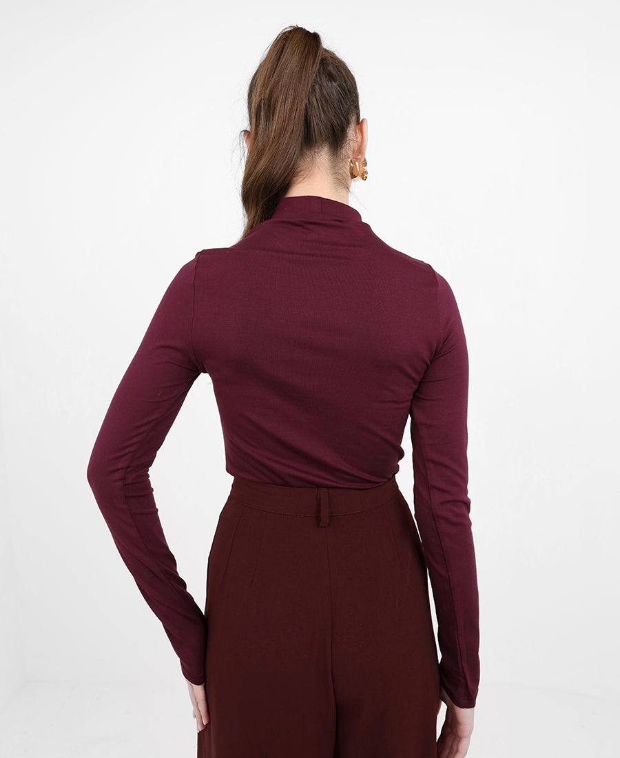 long-sleeved black turtleneck bodysuit