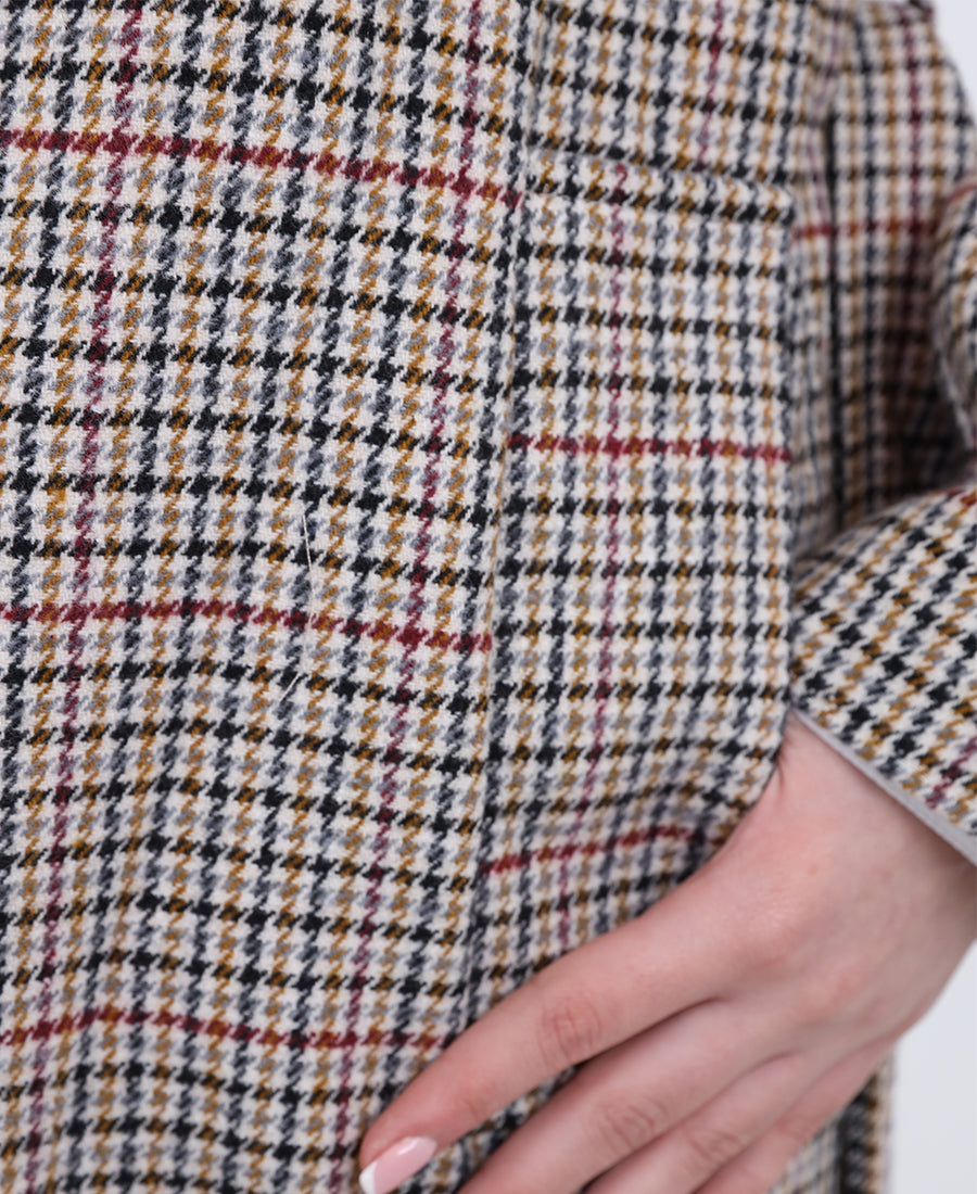 Long striped jacket with a belt at the waist