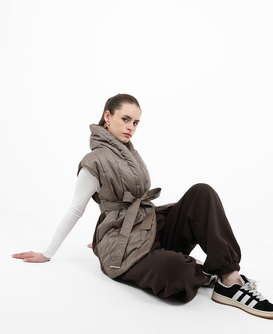 Vest on the back is wool with belt