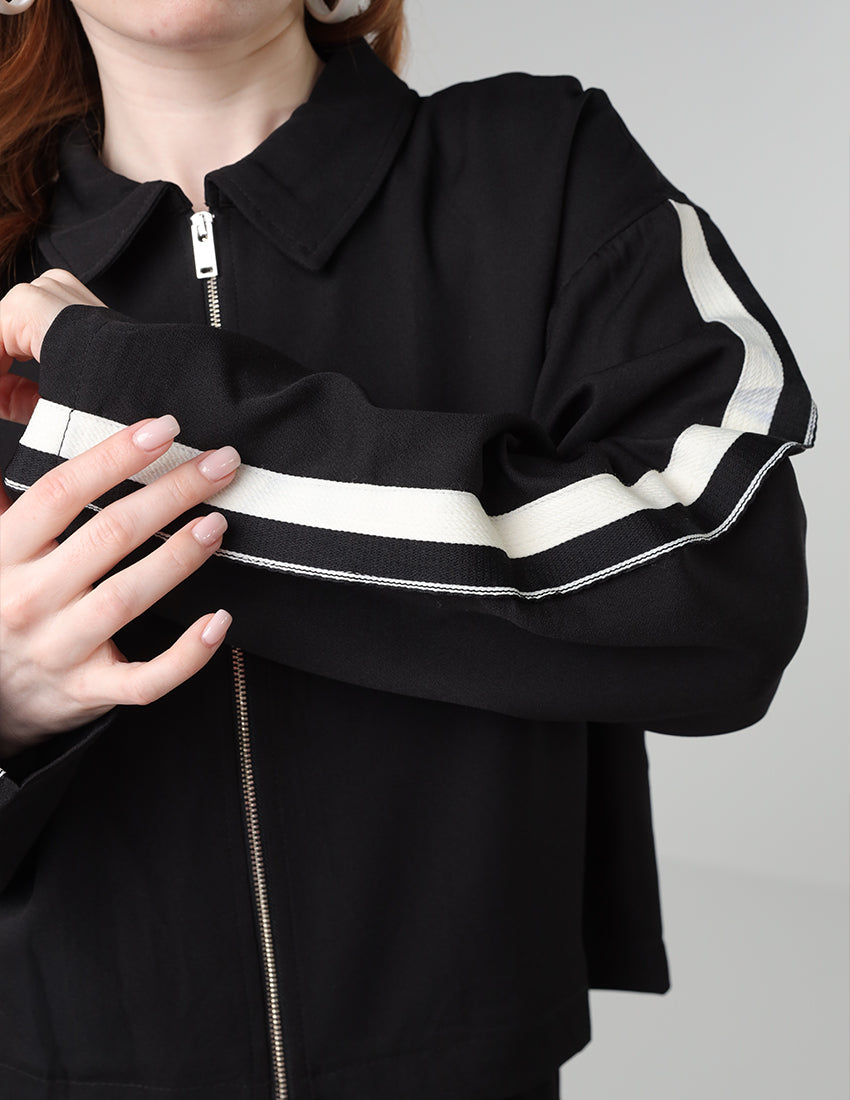 Black jacket and pants set with a side stripe