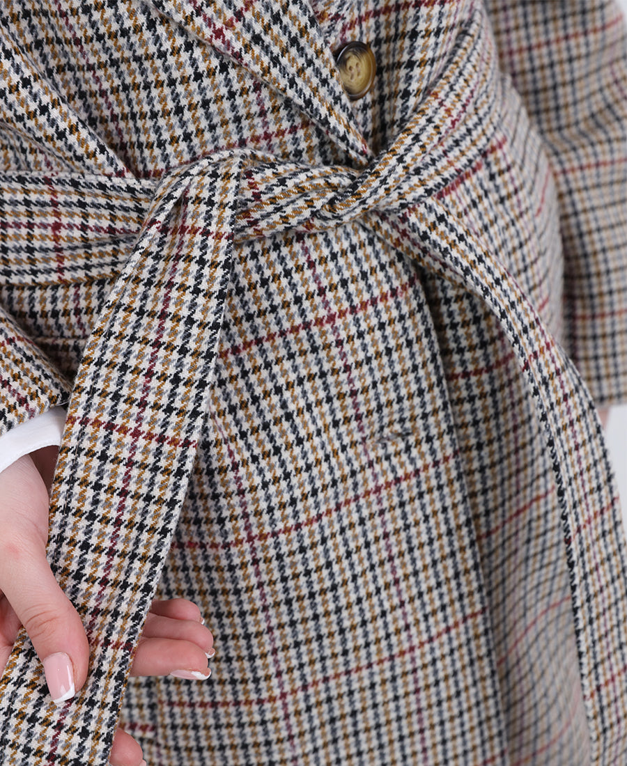 Long striped jacket with a belt at the waist