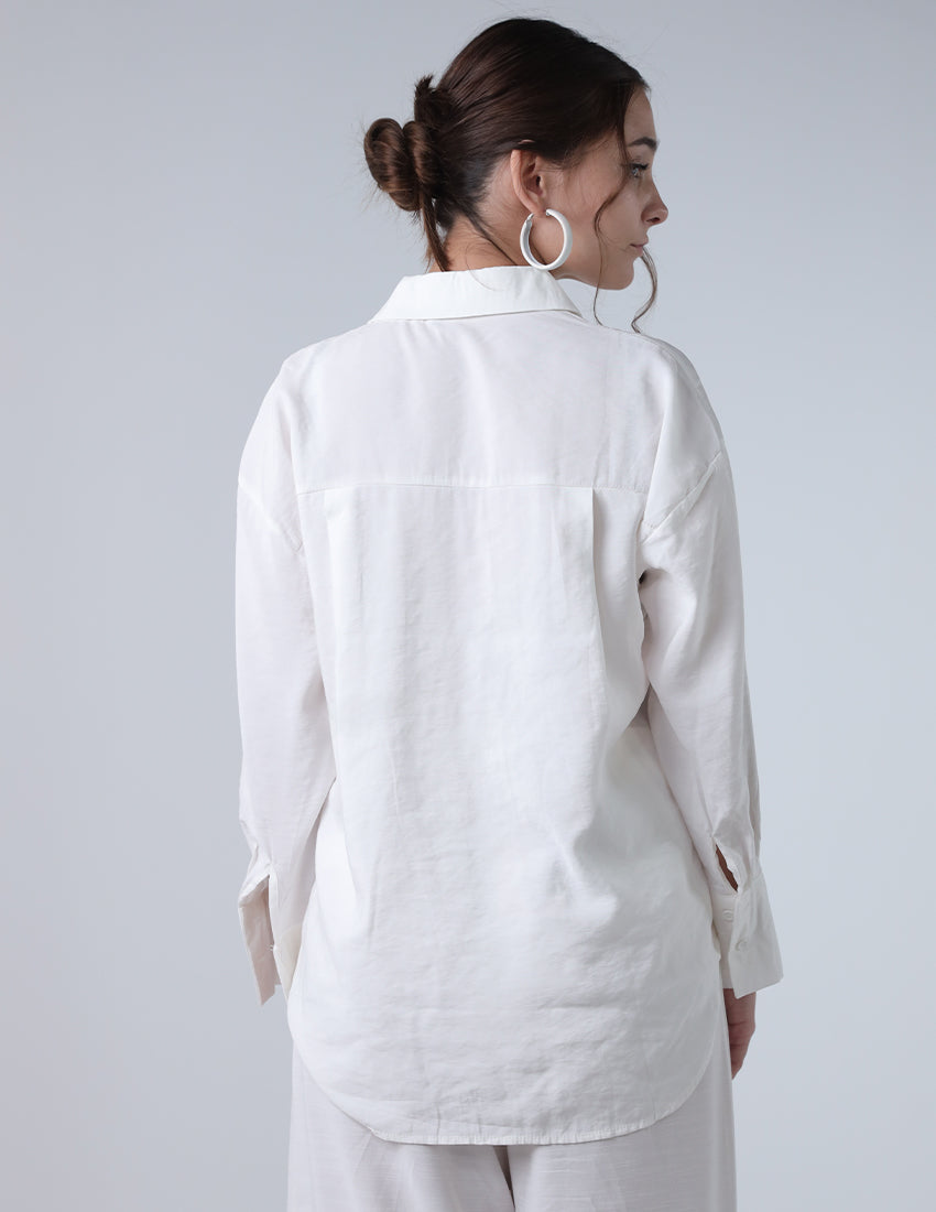 قميص كبير الحجم مع جيب جانبي