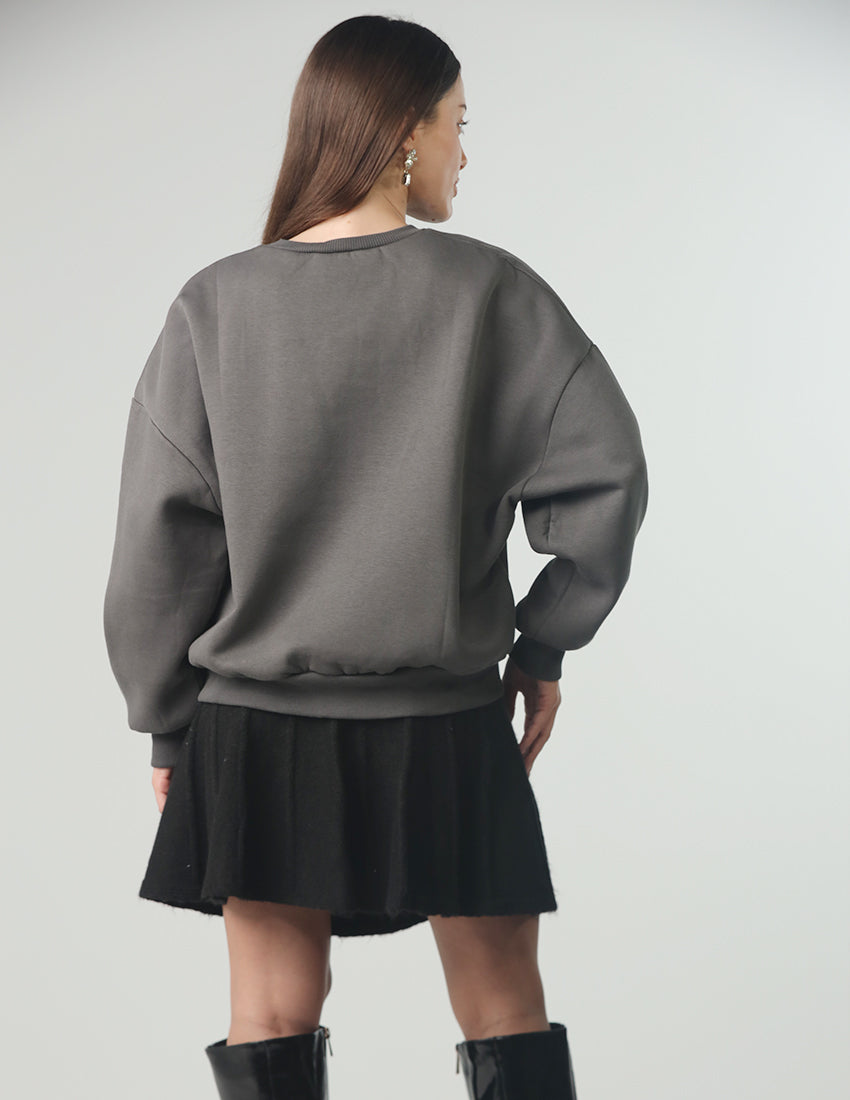 Grey Sweater With a star shape on the top