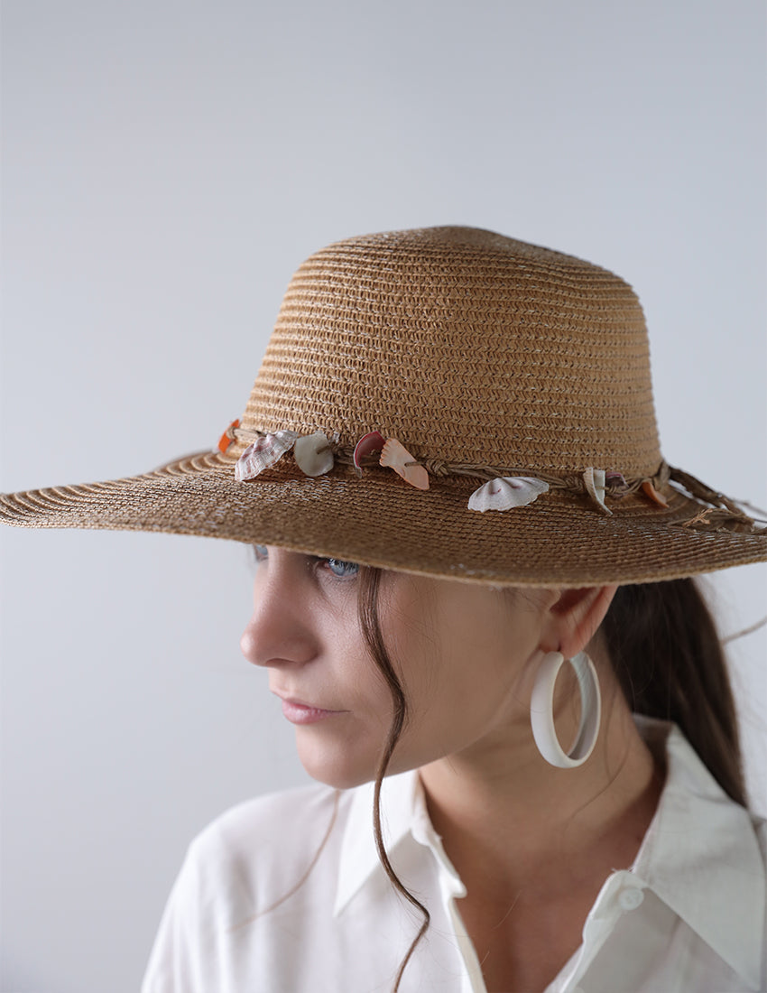 Dark beige priest's hat with a seashell tie