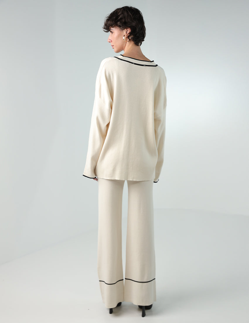 طقم تريكو من قطعتين: كارديجان بأزرار مع بنطال مستقيم