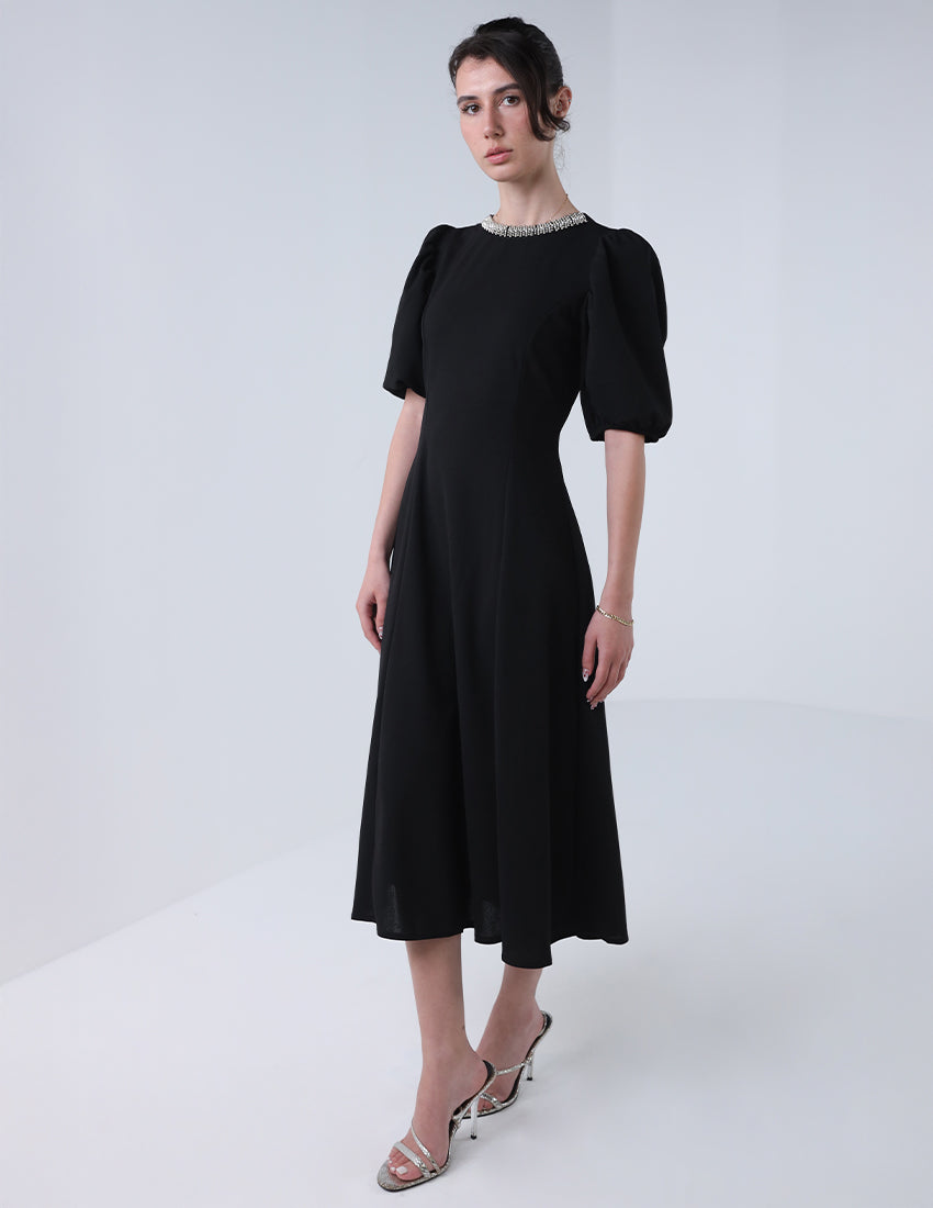 Flowy midi dress with a round neckline and rhinestones