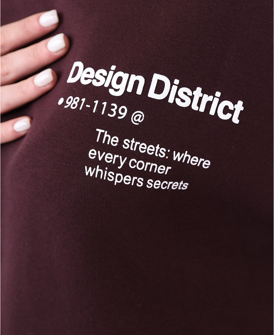 Maroon hoodie with printed words