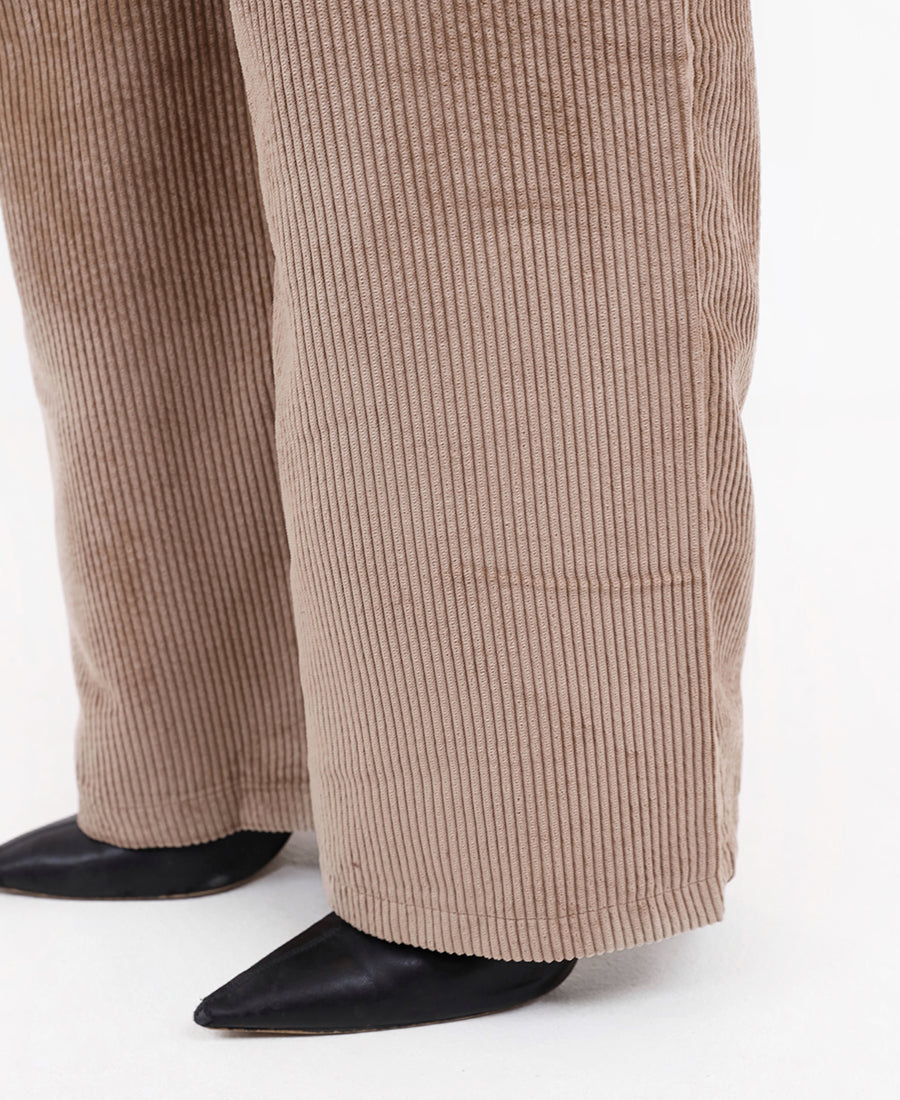 Beige ribbed trousers with a belted waist