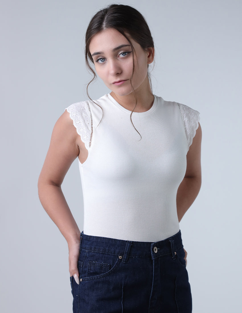 Top featuring delicate lace sleeves