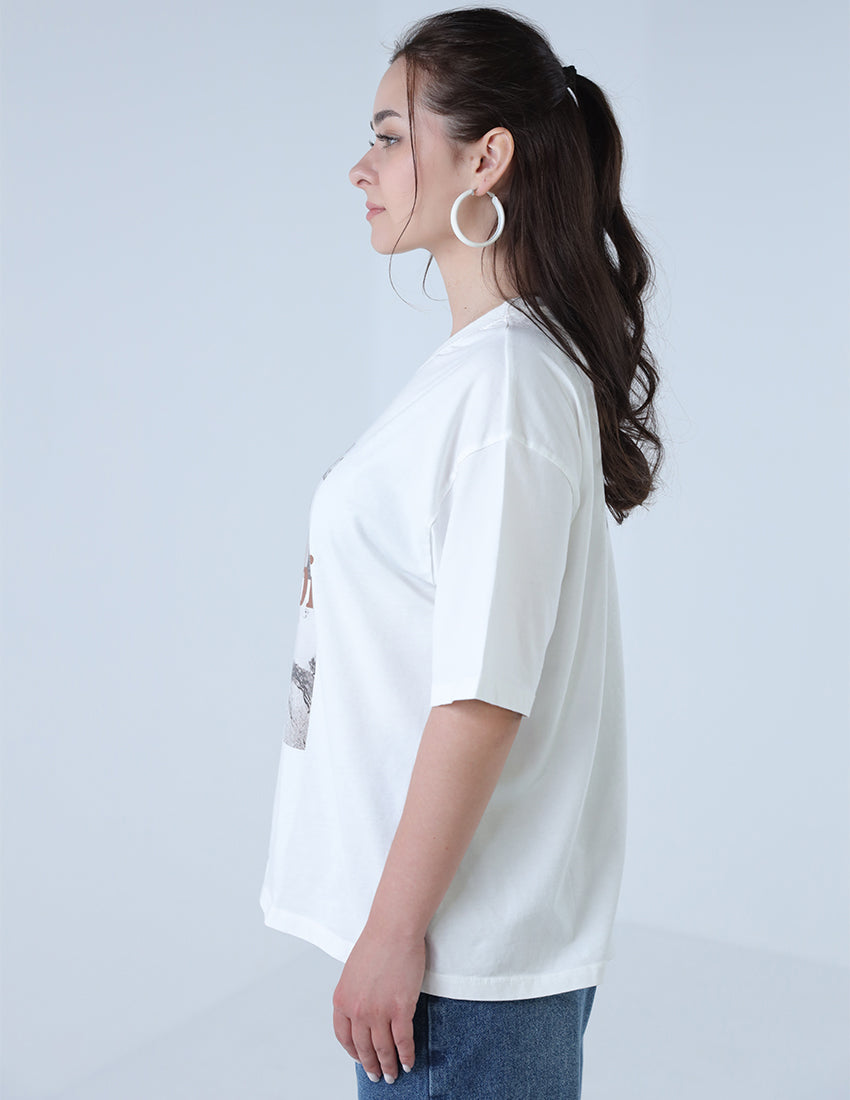 T-shirt with four pictures of girls and writing in the middle.
