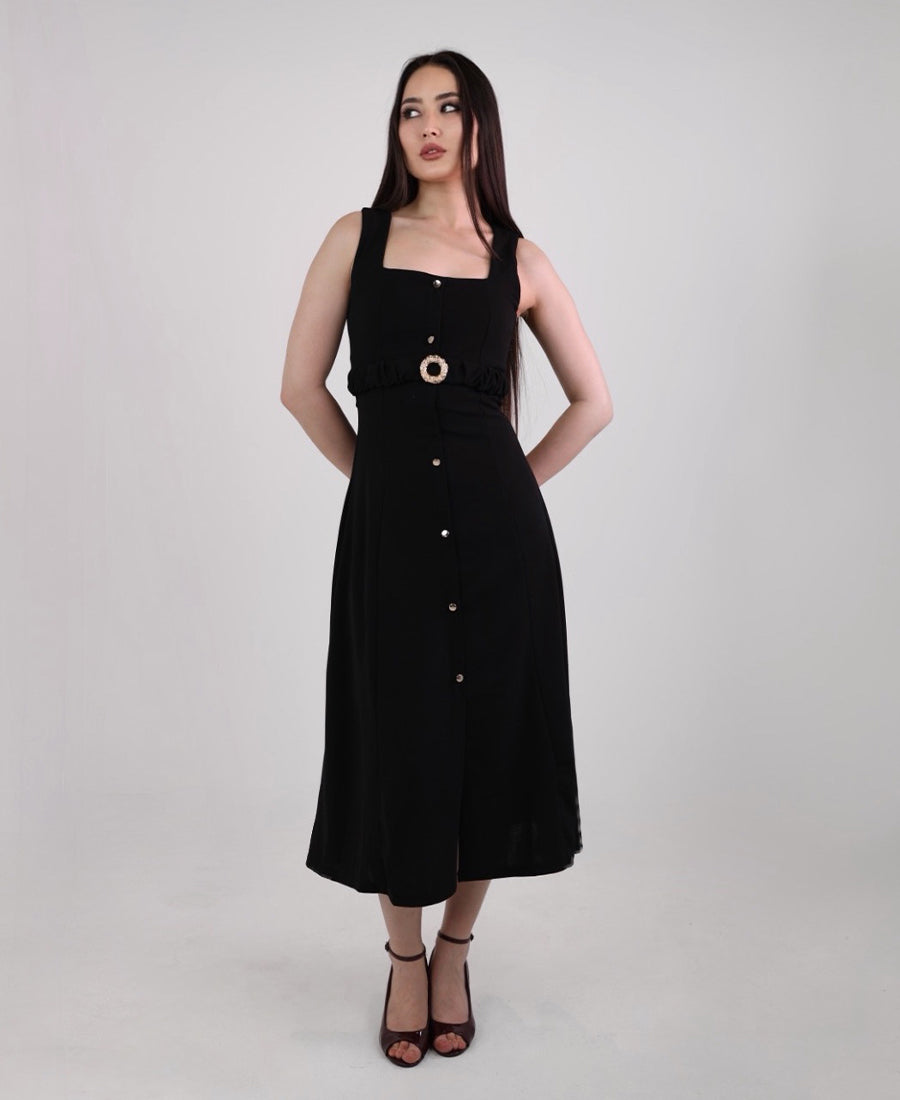 Long black dress with buttons and a gold belt