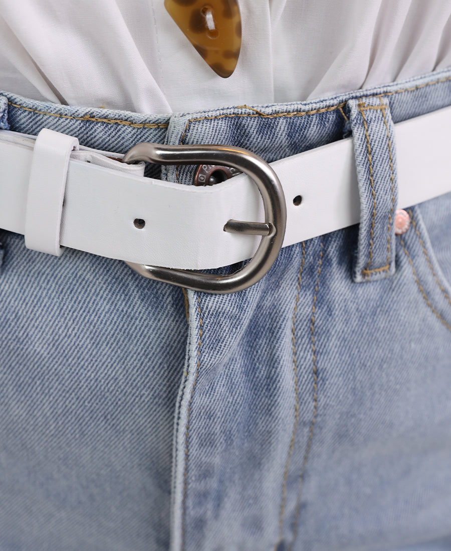 Straight-leg jeans with a white belt