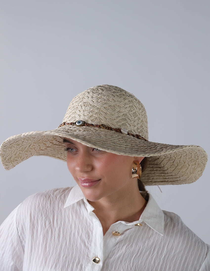 Beige priest's hat with eye patch