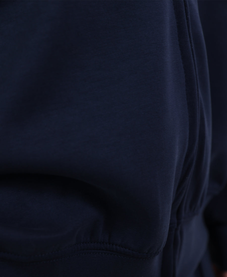 Over-size sweater with a zippered line down the middle