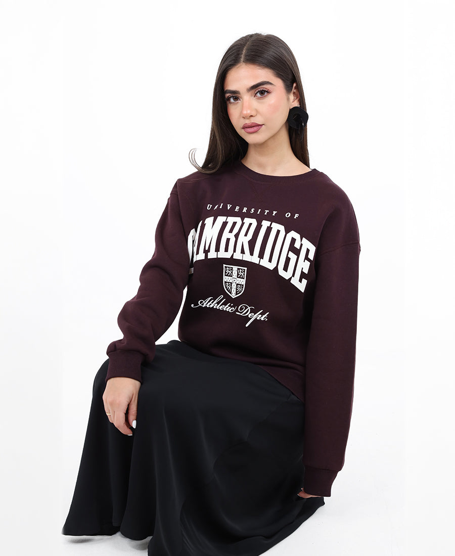Maroon sweater with printed words