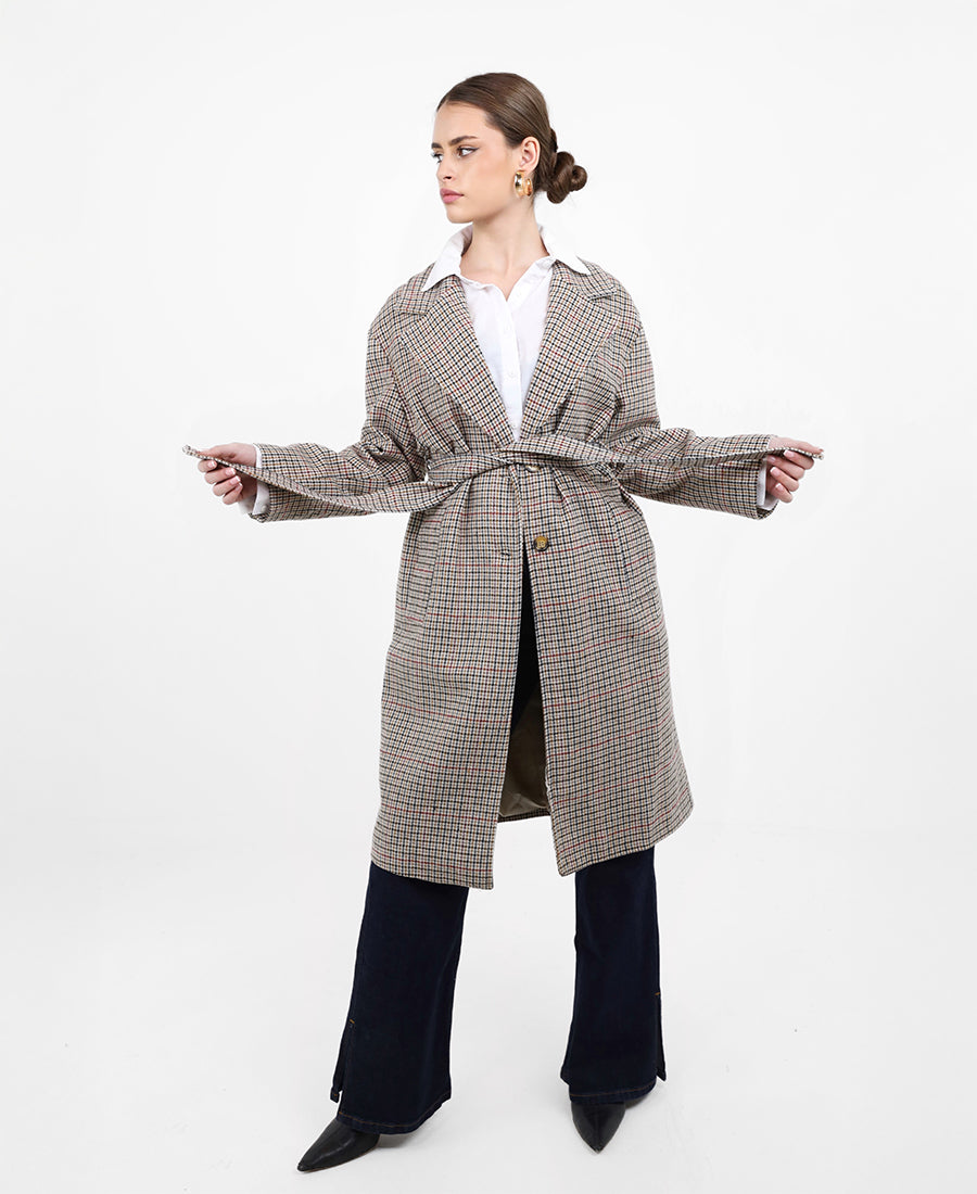 Long striped jacket with a belt at the waist