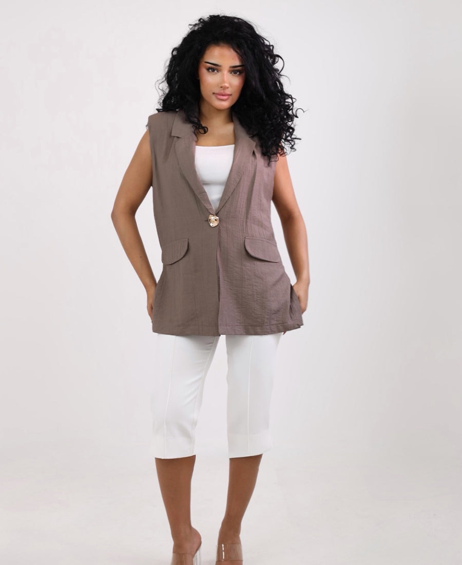 Long vest with golden button