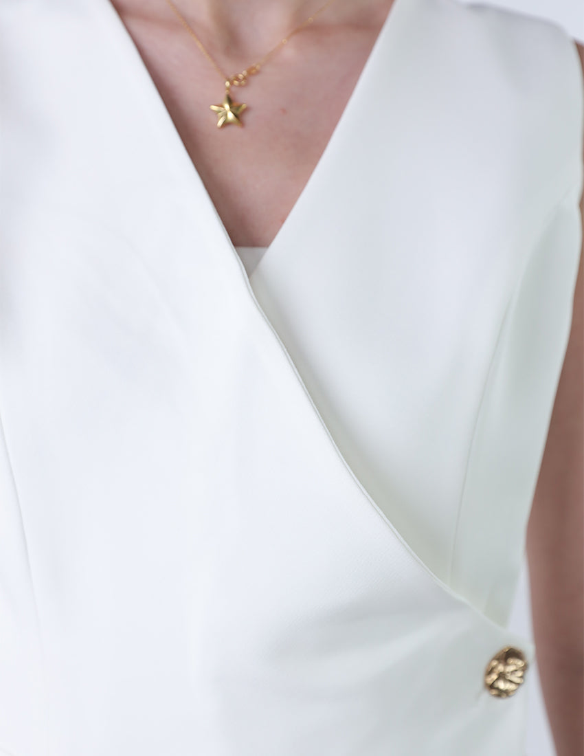 جمبسوت بدون أكمام بقصّة مستقيمة