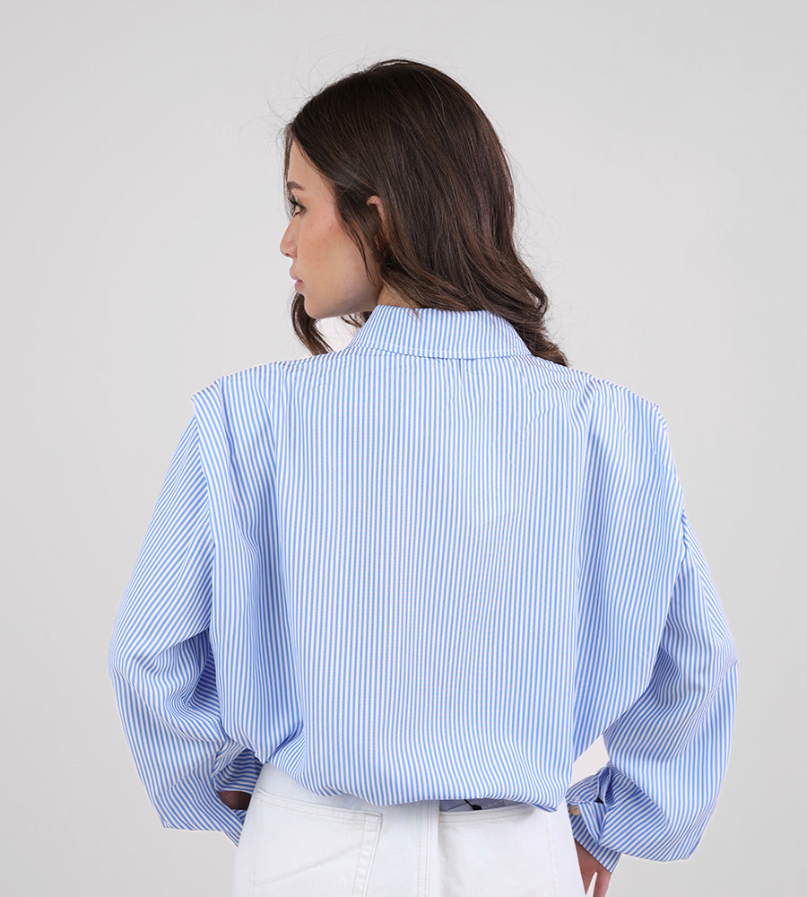 Striped shirt with sun brooch
