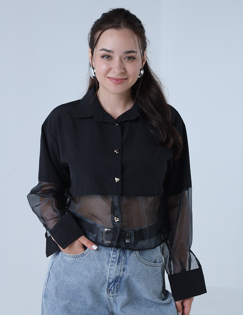 A black shirt with chiffon at the waist and golden heart-shaped buttons.