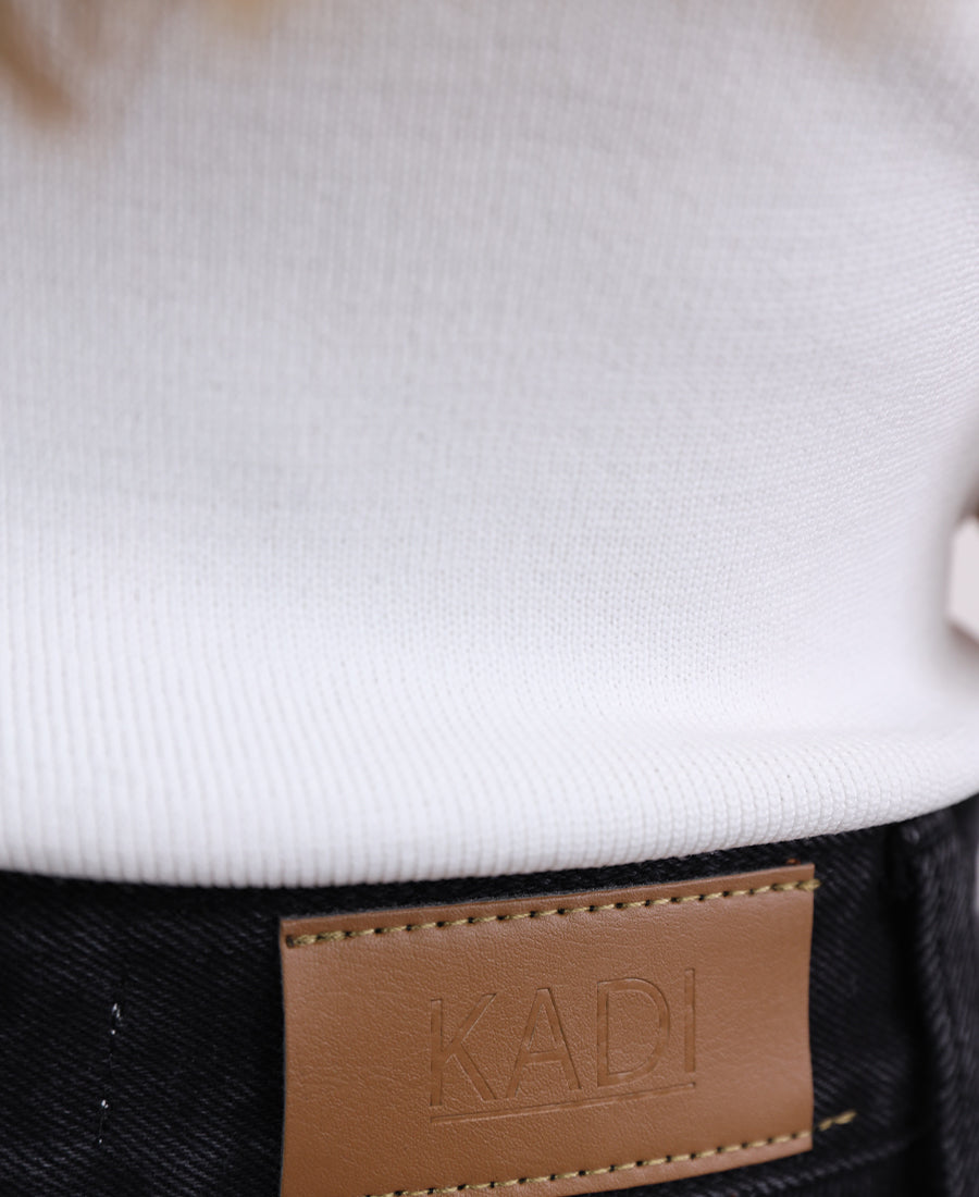 Black straight jeans with a side stripe